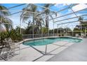 Beautiful screened-in pool area with ample patio space and lush landscaping for outdoor enjoyment and privacy at 3713 Ocita Dr, Orlando, FL 32837