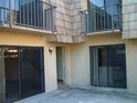 Patio view highlighting balconies and sliding glass doors at 5327 Bamboo Ct # 426, Orlando, FL 32811