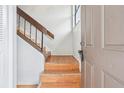 A welcoming entryway with wood stairs leads to the main living area at 3118 S Semoran Blvd # 2, Orlando, FL 32822