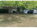 A quaint single-story home features a well-maintained front lawn and attached garage at 2645 Ne 44Th St, Ocala, FL 34479