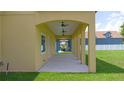 View of the patio with ceiling fans, offering a cool outdoor retreat and ample space at 1919 Sipes Ave, Sanford, FL 32771