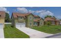 A well kept home with a two car garage and a concrete driveway at 1929 Sipes Ave, Sanford, FL 32771