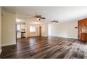 Open-concept living space features an eat-in kitchen and an adjacent dining area at 3312 Victory Palm Dr, Edgewater, FL 32141