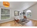 Inviting living room with vaulted ceilings, natural light, comfortable seating, and contemporary decor at 3706 Andover Cay Blvd, Orlando, FL 32825