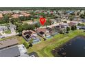 Residential neighborhood featuring many homes with private screened-in pools and solar panels at 1111 Liberty Hall Dr, Kissimmee, FL 34746