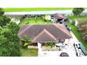 Well-maintained home with a large backyard, detached garage and plenty of parking space at 12207 Florida Woods Ln, Orlando, FL 32824