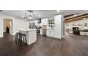 Modern kitchen features a center island, stainless steel appliances, and ample cabinet space at 1523 N Beach St, Ormond Beach, FL 32174