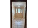 Inviting home foyer featuring decorative tile flooring and a front door with sidelights at 3917 Lake Mira Dr, Orlando, FL 32817
