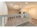 Bright living room with vaulted ceilings, modern lighting, and wood-style floors at 6019 Crystal View Dr, Orlando, FL 32819