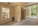 Welcoming covered entrance showcasing elegant design and convenient access to the residence at 664 Kenwick Cir # 104, Casselberry, FL 32707