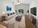 Bright living room featuring a neutral color scheme, vaulted ceilings, and sliding glass doors at 142 E 9Th St, Chuluota, FL 32766