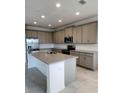 Modern kitchen featuring stainless steel appliances and spacious granite countertops at 483 Shadow Gorge Way, Eustis, FL 32736