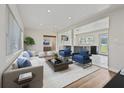 Bright living room with modern furnishings, creating a welcoming and stylish gathering space at 5521 Makoma Dr, Orlando, FL 32839