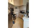 Efficient kitchen with modern appliances and ample counter space at 7230 Westpointe Blvd # 1235, Orlando, FL 32835