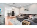 Comfortable living room featuring an open layout and wood flooring at 2021 Sweet Birch Ln, Orlando, FL 32828