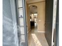 Inviting foyer with tile flooring leading to a spacious open floor plan at 506 Terrace Spring Dr, Orlando, FL 32828