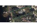 Aerial view showing property lines and proximity to the water at 606 Butler St, Windermere, FL 34786
