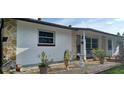 Cozy home showcasing stone siding, plants, and brick accents at 10928 Tangora St, Orlando, FL 32825