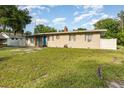 Classic single-story home with a well-maintained lawn and subtle landscaping at 131 N Central Ave, Apopka, FL 32703