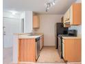 Charming kitchen featuring modern appliances, ample cabinetry, and a functional layout at 711 Sugar Bay Way # 109, Lake Mary, FL 32746