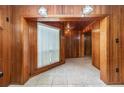 Inviting interior with decorative woodwork and tile flooring at 123 Se 1St Ave, Webster, FL 33597