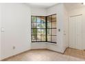 Bright dining area featuring a corner window and tile flooring leading into the entry hallway at 2838 Maldive Ct, Deltona, FL 32738