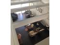 Spacious living room with high ceilings and bright, natural light at 310 W Lake Ave, Auburndale, FL 33823