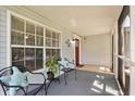 Relaxing screened porch with comfortable seating and a view of the outdoors at 1358 Brookebridge Dr, Orlando, FL 32825