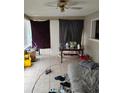 Living room with tiled floor, and natural lighting at 1152 Ring St, Deltona, FL 32725