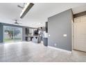 Modern kitchen with gray cabinets, stainless steel appliances, and an island at 14088 Tarvin St, Orlando, FL 32832