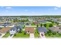 Well-maintained neighborhood with homes featuring manicured lawns and mature trees at 4529 Orchard Grove Rd, St Cloud, FL 34772