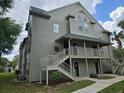 A side view of the two-story apartment building at 5980 Westgate Dr Dr # 202, Orlando, FL 32835
