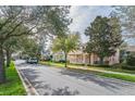 Quiet street showcasing well-maintained homes and mature trees in a desirable neighborhood at 7184 Maleberry Run, Winter Garden, FL 34787