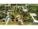 Aerial view of a single Gathering home on a large lot, surrounded by trees and other houses at 19606 Reynolds Pkwy, Orlando, FL 32833