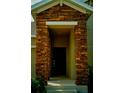 Close-up of the home's front entryway with brick pillars at 1889 Blissful Dr, Kissimmee, FL 34744