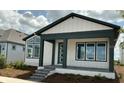 Charming single-story home with a covered porch, stone steps, and modern design, plus a well-maintained yard at 2971 Embark Trail, St Cloud, FL 34771