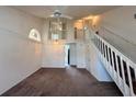 Spacious living room featuring high ceilings, lots of natural light, and a staircase at 3352 Hamlet Loop, Winter Park, FL 32792