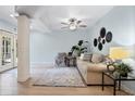 Inviting living space with a ceiling fan, contemporary decor, and a view to the outdoors at 901 E Pine St # 2, Orlando, FL 32801