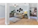 Comfortable living room showcasing neutral tones, stylish decor, and wood flooring at 901 E Pine St # 2, Orlando, FL 32801