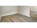 A spacious room featuring luxury vinyl plank flooring at 4209 Sw 33Rd St, Ocala, FL 34474