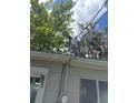 Shows electrical wiring and meter attached to the outside of the home at 1047 Clay Blvd, Eustis, FL 32726