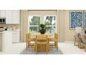 Cozy dining room featuring a wooden table with seating for six and natural lighting at 431 Puma Loop, Groveland, FL 34736