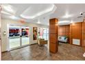 A well-decorated lobby area with wood trim, tile floors, and comfortable seating at 690 Osceola Ave # 410, Winter Park, FL 32789