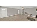 Spacious living room featuring tile floors and an arched doorway at 1506 S Elliott St, Sanford, FL 32771