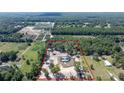 Expansive aerial view of the property showcasing the beautiful home and land at 10750 Sw 110Th St, Dunnellon, FL 34432