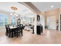 Inviting living and dining spaces with elegant furnishings and a welcoming atmosphere at 11850 Sheltering Pine Dr, Orlando, FL 32836