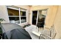 Cozy outdoor patio area with seating, perfect for enjoying the fresh air at 12621 Tanja King Blvd, Orlando, FL 32828