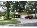 Spacious driveway leads to an attached garage, offering ample parking and convenience at 1420 Center St, Ocoee, FL 34761