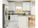 Bright kitchen featuring stainless steel appliances, an island, and ample storage at 7374 Ivy Tendril Ave, Orlando, FL 32829