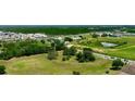 Aerial shot showcasing the development potential of a large plot, close to commercial development at 130 Winsor Ave, Davenport, FL 33837